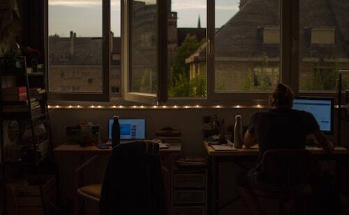 Working and looking out of window