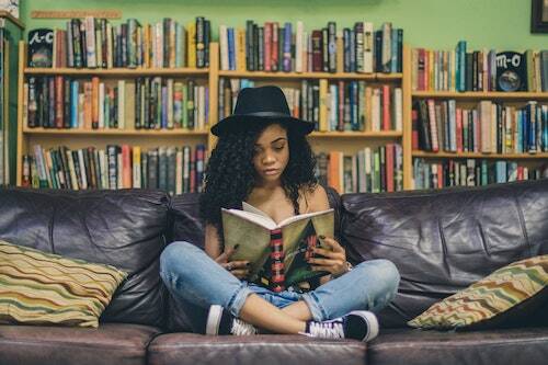 Woman on sofa reading